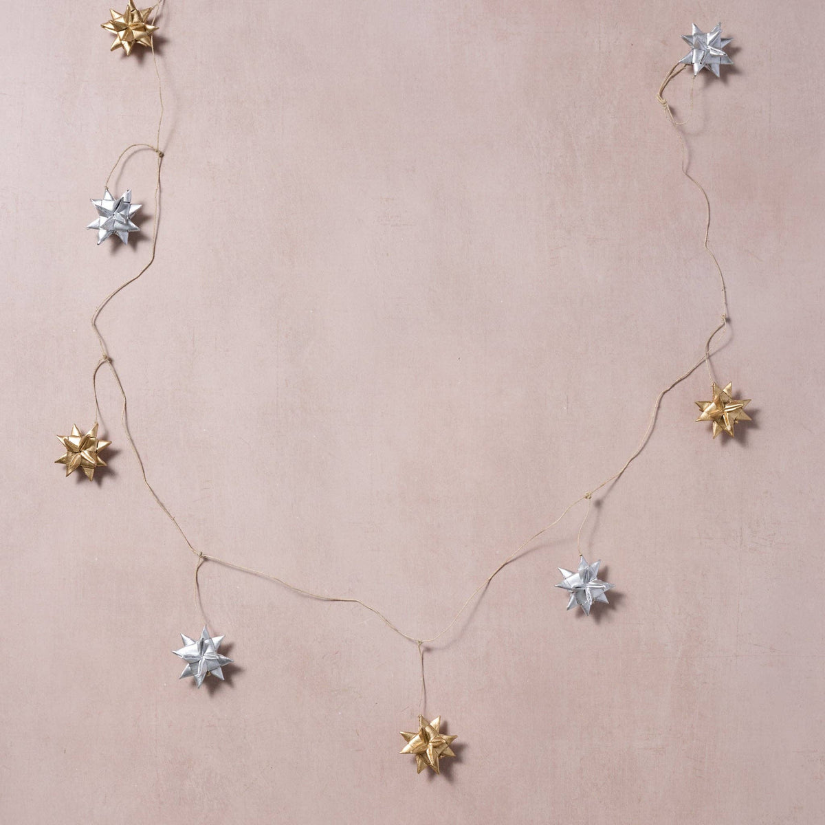 Veda Silver + Gold Metallic Star Palm Leaf Garland